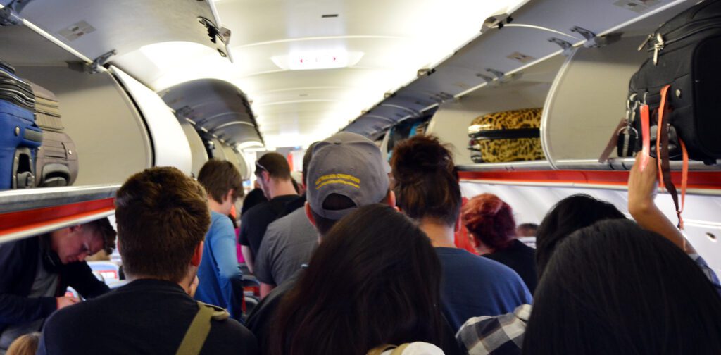 Passengers offloading plane