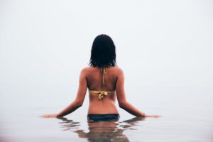 woman wading in water